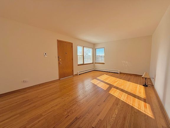 Sunny living room with Southern exposure.