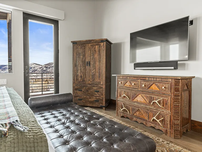 King Ensuite Bedroom 1 | Armoire with Smart TV