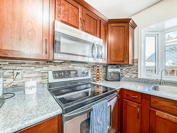 3rd image of 48 W Midglen Way SE