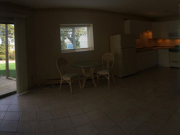 Living room showing mirrored closet