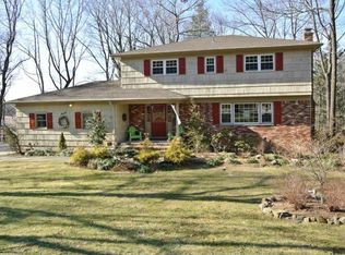7 Woodmont Rd, Pine Brook, NJ 07058