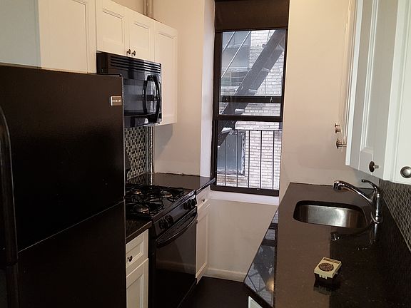 2nd image of 8742 Elmhurst Ave APT 1h