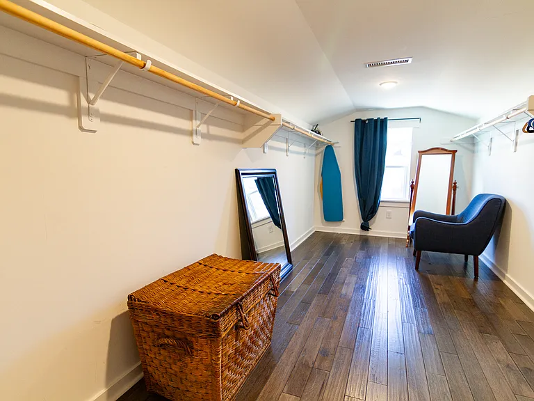 Huge walk in closet for the primary bedroom sits right above the garage. So it is more than enough space to hang up all of your clothes.