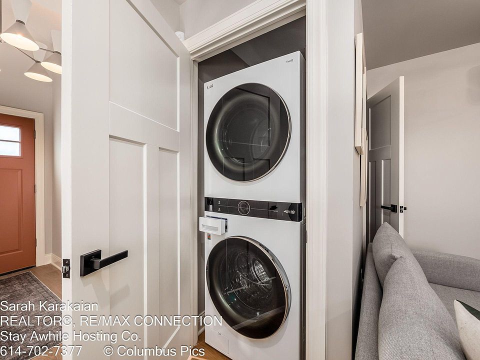 Washer and dryer are located in the closet between the kitchen and living room area.