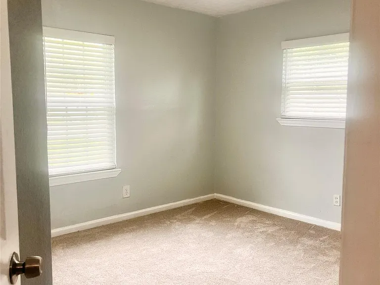 7702 Claiborne St — Photo 13