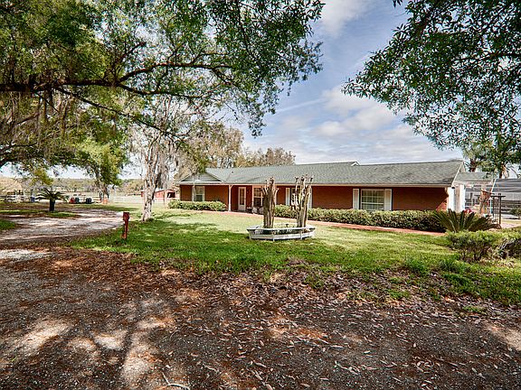 ranch home with majestic oak