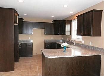 Oak cabinets & ceramic tile floor