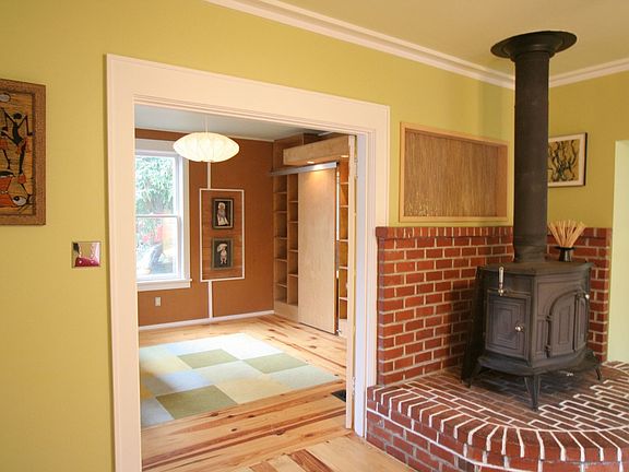 LR has wood stove and beyond, through French doors, is the 2nd BD or den