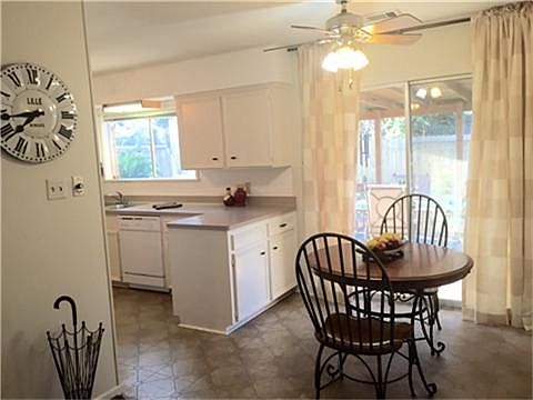 Breakfast Room with Sliding Door to Covered Patio.