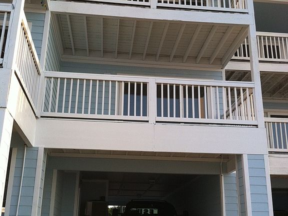 The 2 balconies on the back of the house
