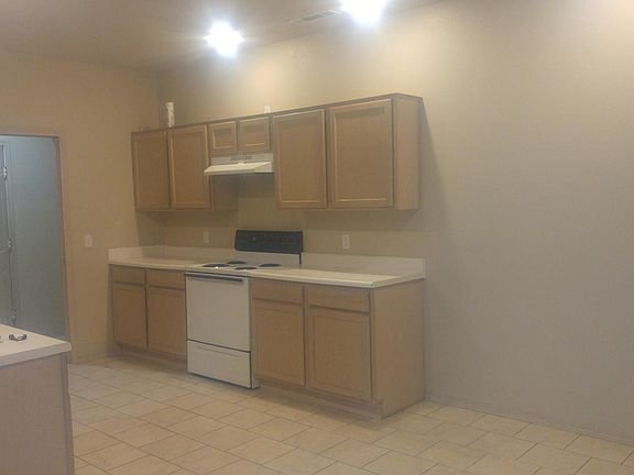 Will have black appliances that includes an above the stove 