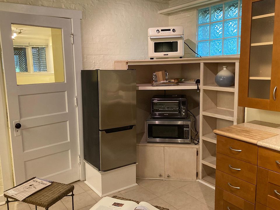 Here is a view of the refrigerator/freezer, electric oven, toaster oven and microwave. The electric oven is also air fries, broils, roasts and dehydrates.