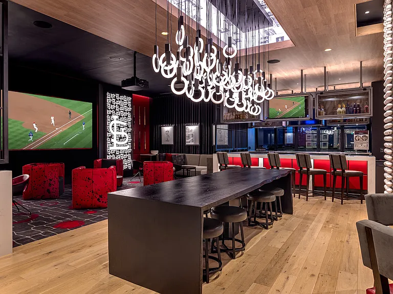The Indoor-Outdoor Full-Service Bar at One cardinal Way Luxury Apartments
