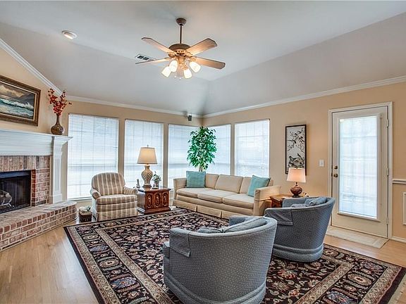 All of the Architecture and Style of a larger home, this 3 bedroom 2 bath beauty features tall ceilings, raised hearth gas log fireplace, wood flooring throughout the living areas and kitchen. Simply Stunning.