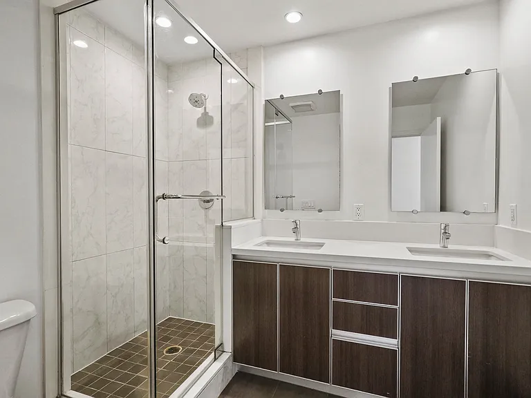 Bathroom with Double-Sink Vanity and Walk-In Shower