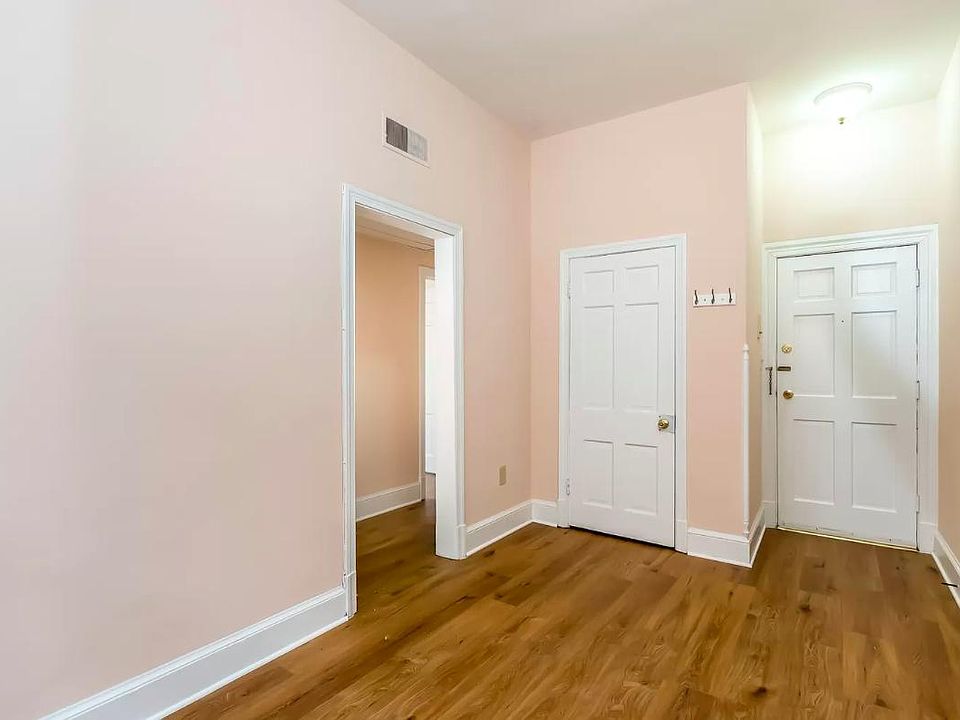 Living Room with spacious storage closet and intercom system