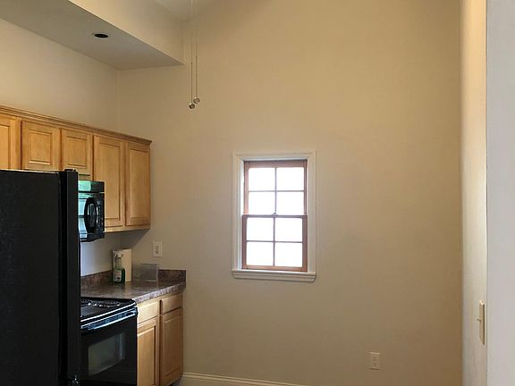 Kitchen, window faces back yard.