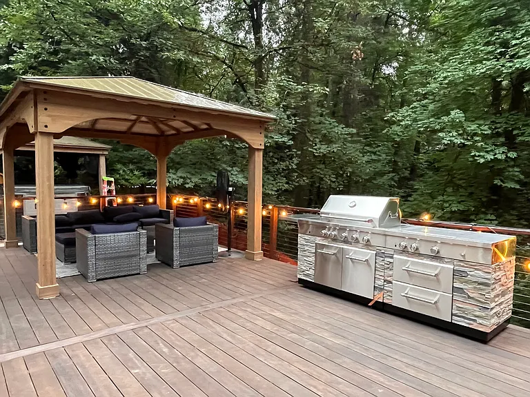 Outdoor Deck with grill and seating.