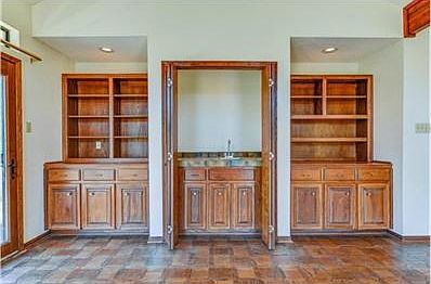 Built ins and wet bar in the living room