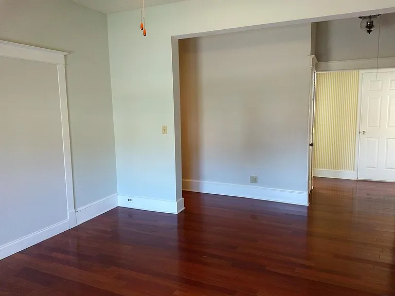 Living room with hall visible.