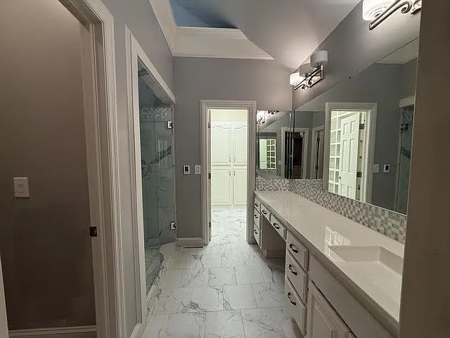 Main Floor Suite, Dressing Vanity bath, with walkin closet and extra storage.