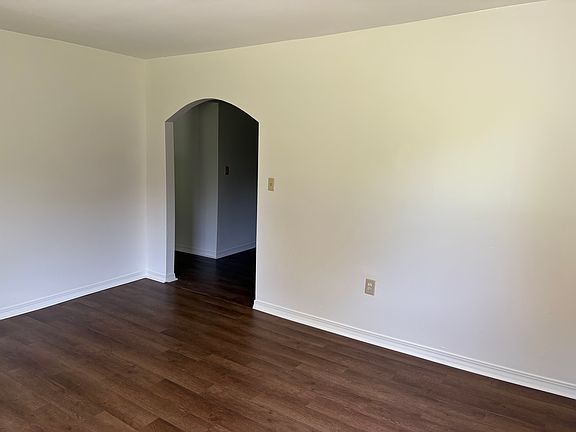 Front room looking toward kitchen and hall