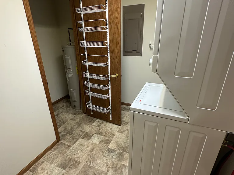 Water heater and furnace room with extra storage.
