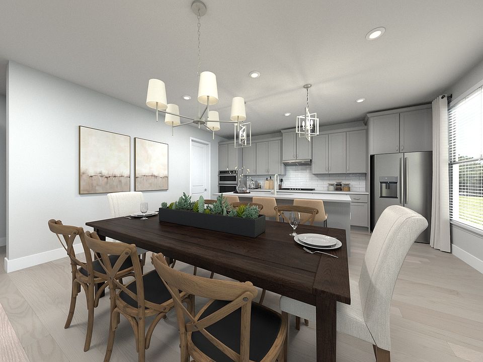The open-concept floorplan allows for an easy flow between the kitchen and dining areas.