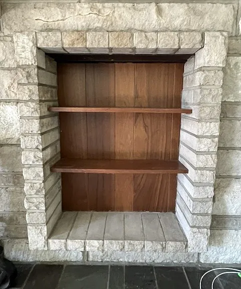 Fireplace built in bookcase.