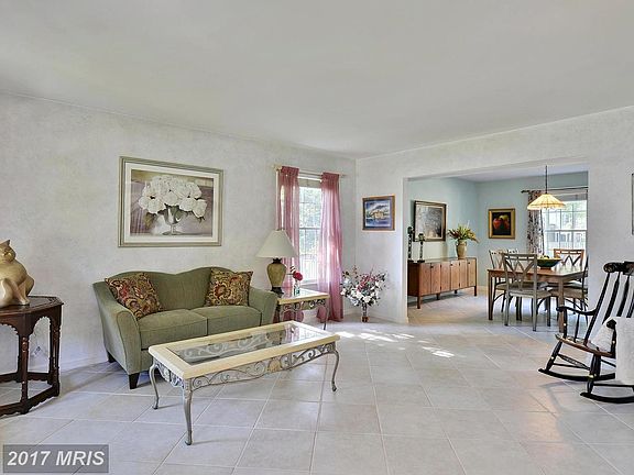 Living Room flows into the formal Dining Room