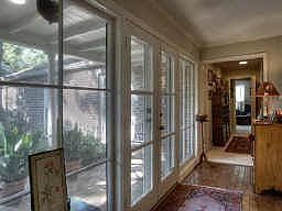 Enter home from front brick courtyd entry through double insulated doors. Interior entry of brick pa