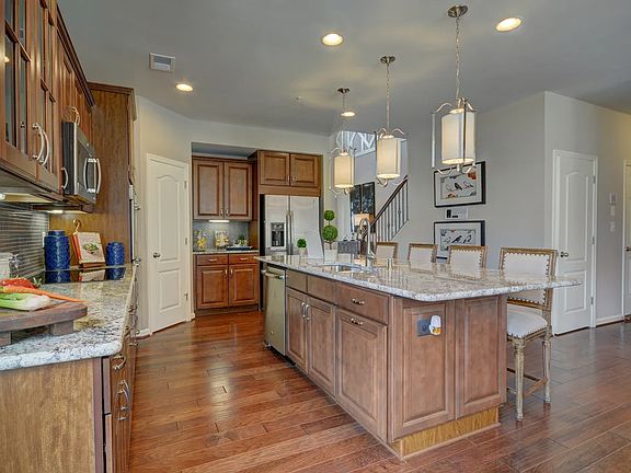 Kitchen with island and pendant lighting
