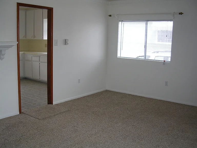 Dining Area with Pocket Door to Kitchen.