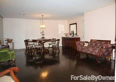 Living/Dinig Room
						:
						This dining/living area features a built in bar and plenty of space