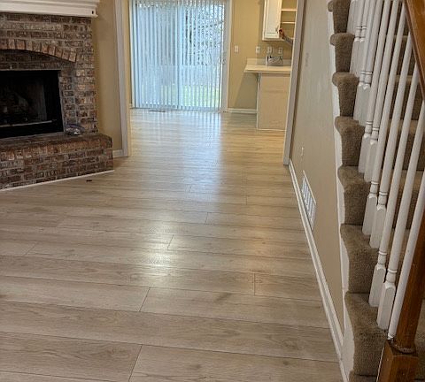 Living room view into kitchen/dining