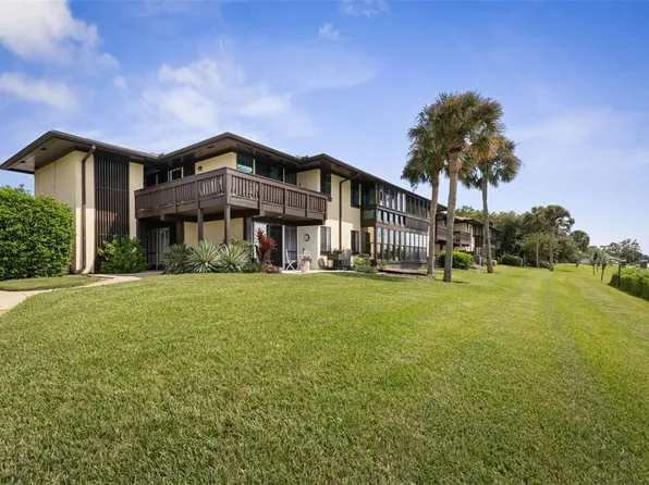 42 CLUB HOUSE DRIVE #104, PALM COAST, FL 32137