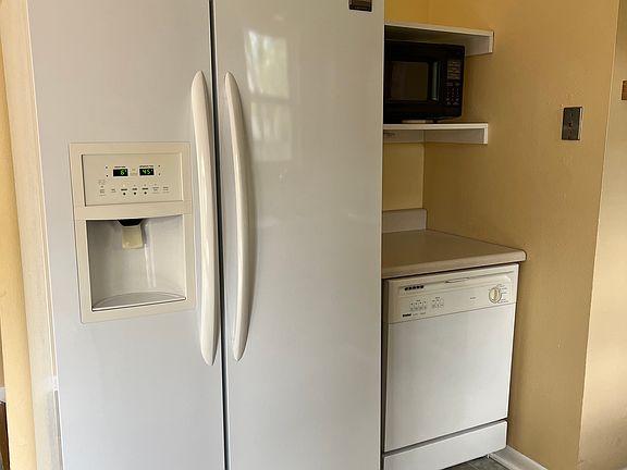 Kitchen with refrigerator & microwave