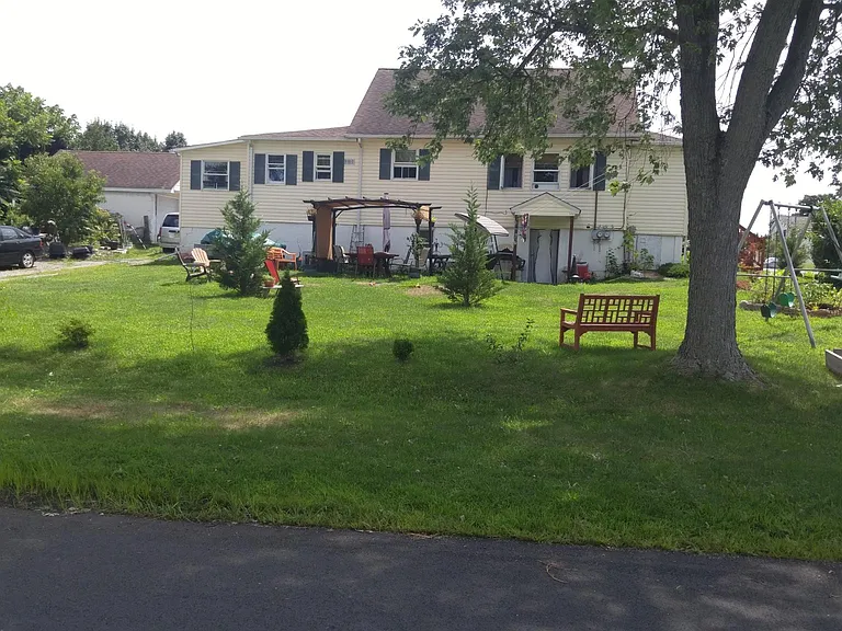 Apartment is on the left side of the house