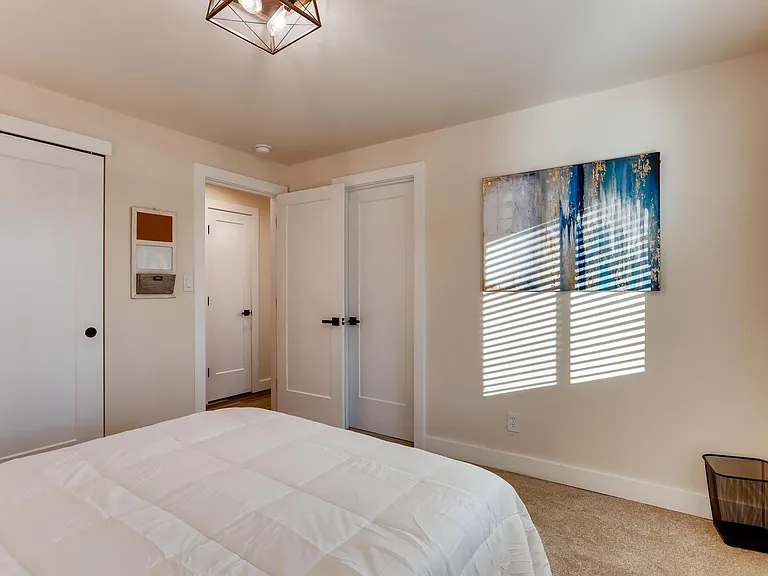 1st Bedroom with a door to get into the bathroom