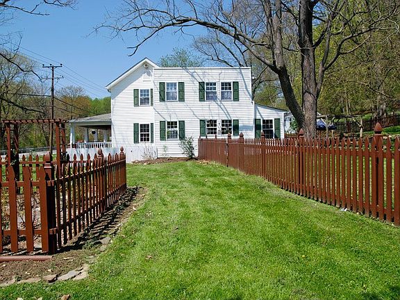 1.54 Acres, fenced patio and rose garden