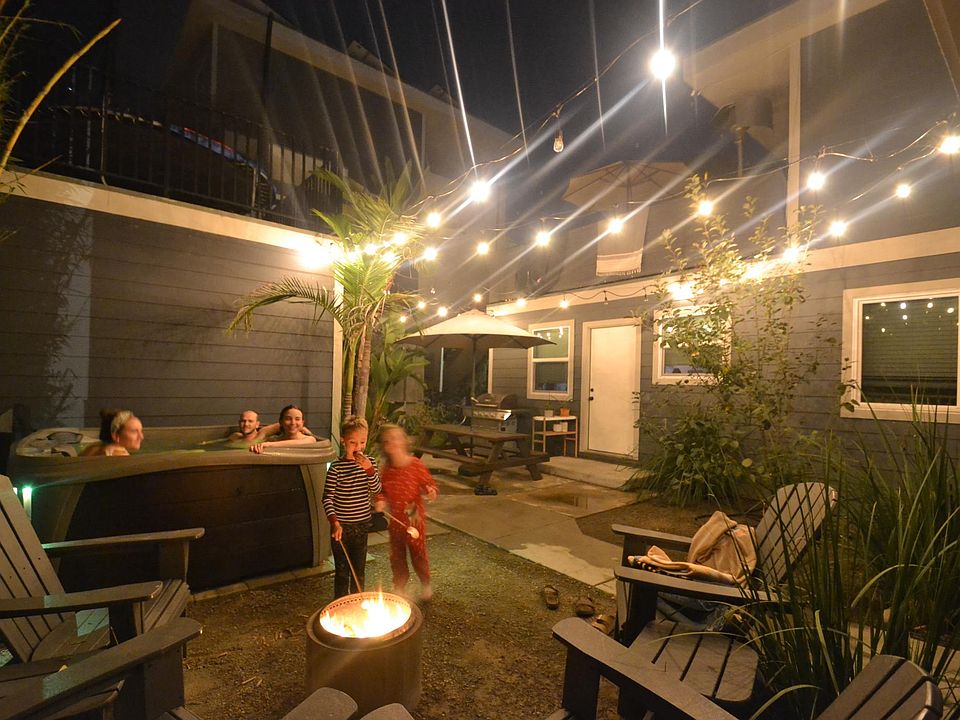 Jacuzzi Courtyard, with Firepit, Adirondack Chairs, and Picnic Tables for community outdoor dinning