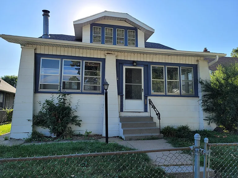 Front of house with enclosed porch