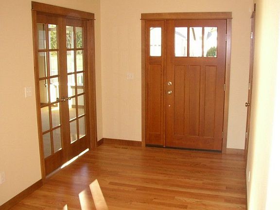 Solid oak floors finished in place, French doors lead to main floor Bonus room!