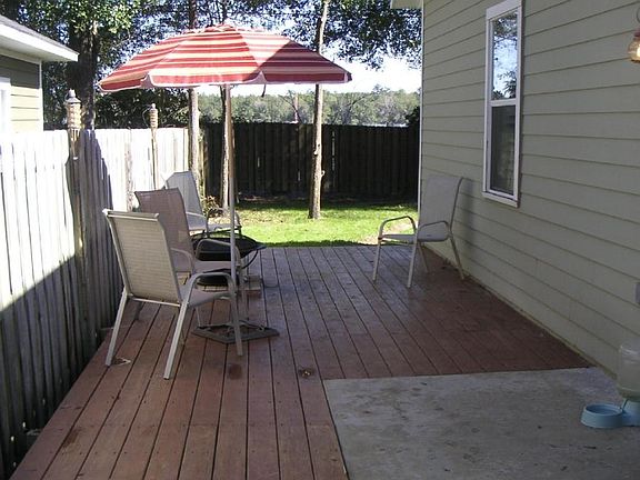 The awesome TREX deck that leads to the screened in back yar