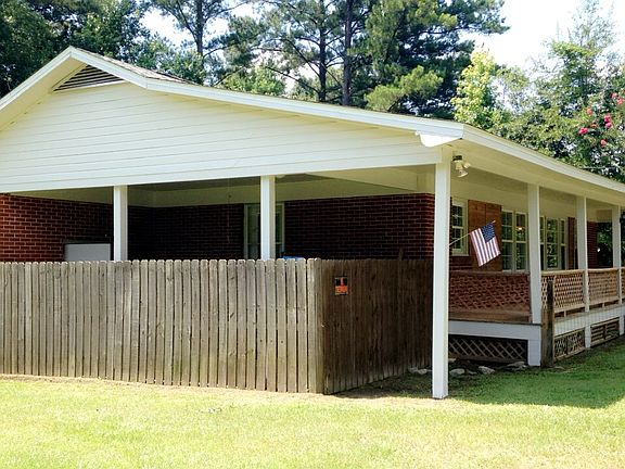 Carport is fenced