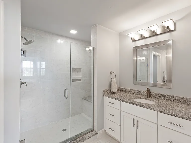 Master bath with his and hers sinks