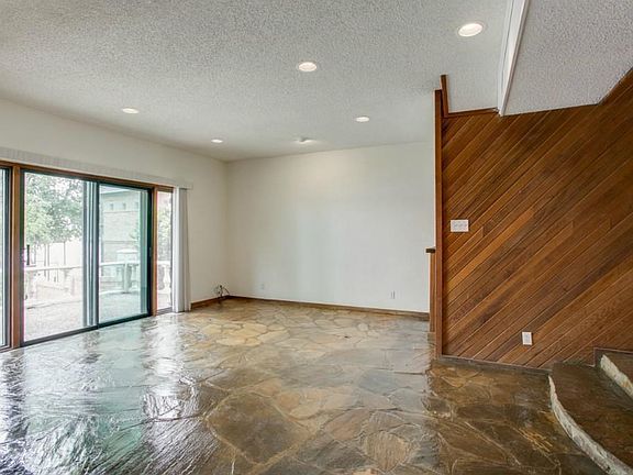 Another view of Living area with Large Windows to view lake.