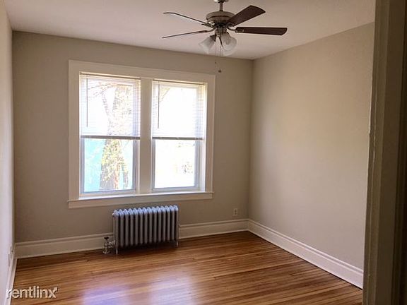 Living room 9 ft ceilings, hardwood floors,