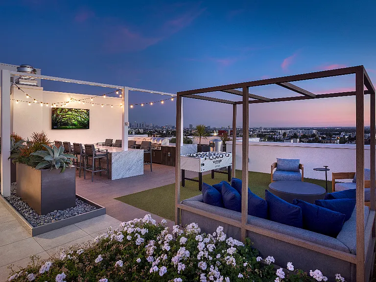Enjoy an evening on our rooftop terrace with stunning views, lounge areas, and alfresco dining areas