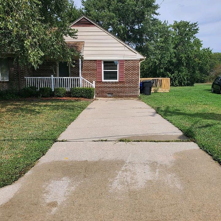 Front view of porch with new railings